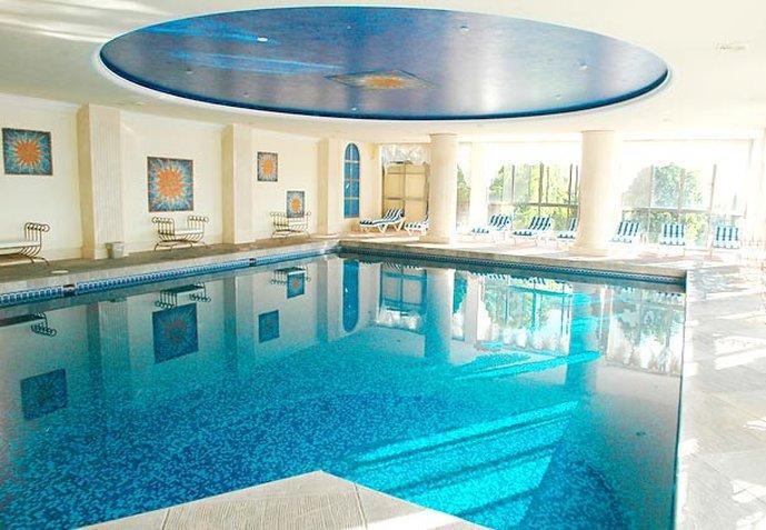 Fiesta Americana Hacienda Ixtapan De La Sal Bagian luar foto The swimming pool at the hotel